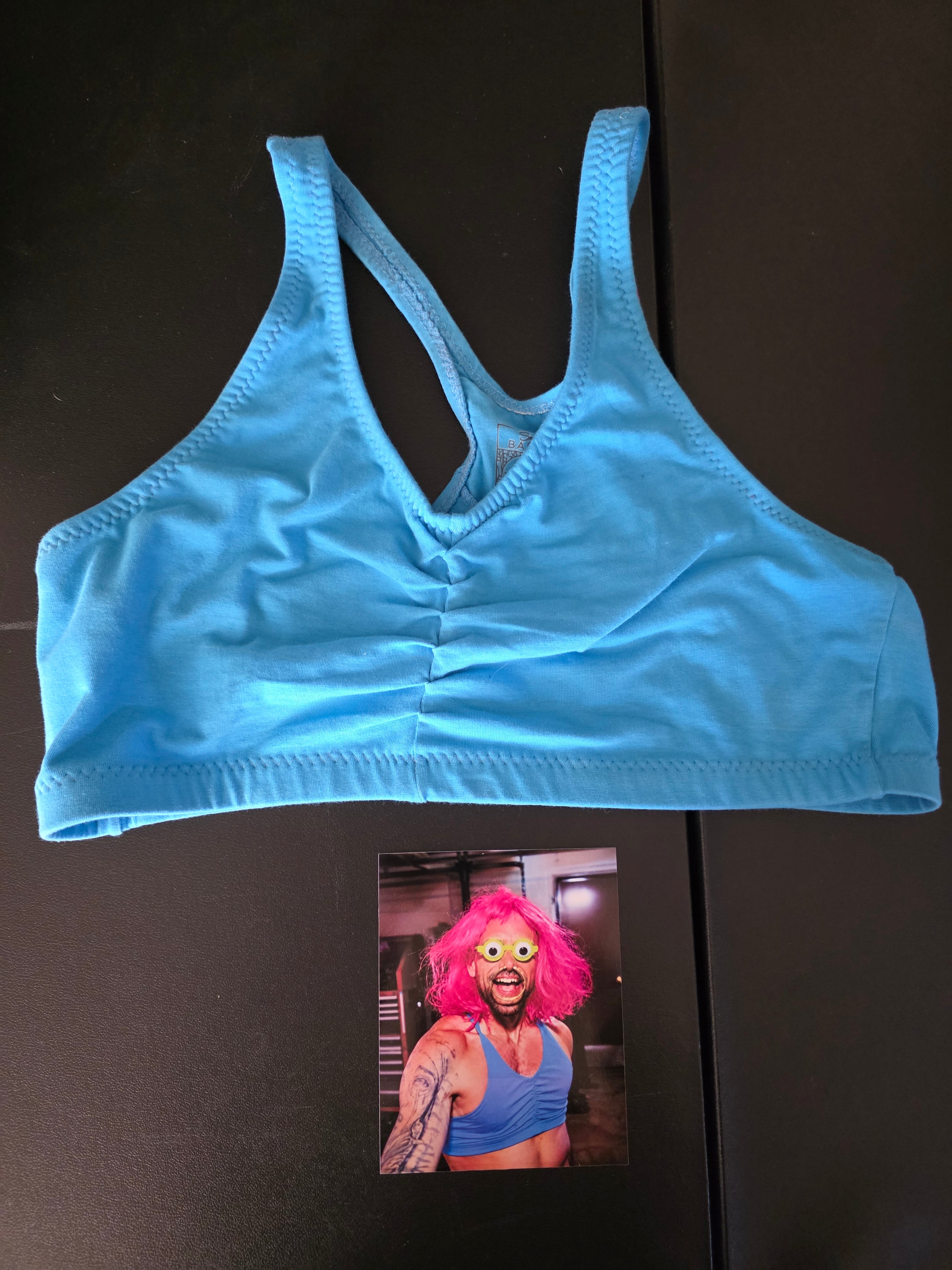 BLUE SPORTS BRA AND PICTURE OF PATRIOTIC BRANDON