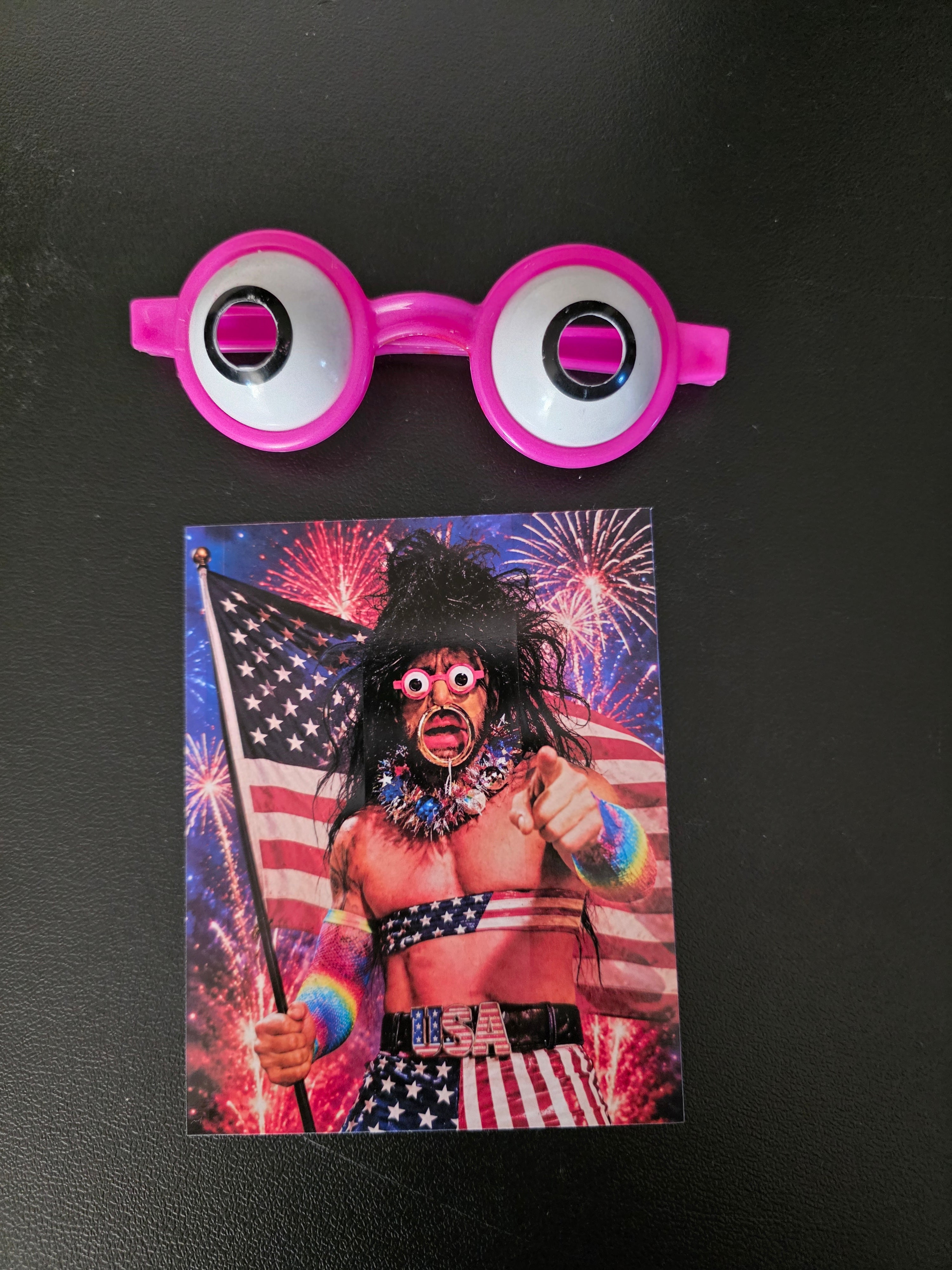 PINK GOOGLY GLASSES AND PICTURE OF PATRIOTIC BRANDON